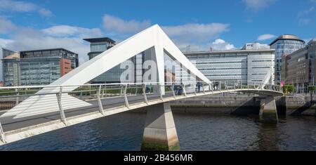 Tradeston Bridge, also known as the Squiggly Bridge, a footbridge, across the River Clyde from Tradeston to Glasgow's financial district