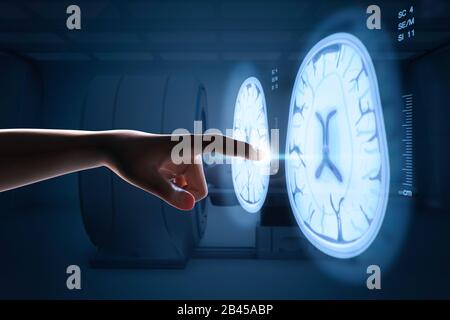 3d rendering human finger point at x-ray brain graphic display Stock Photo