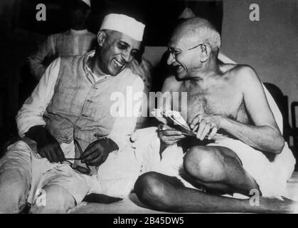 mahatma gandhi sharing light moments with jawaharlal nehru in Mumbai at Maharashtra, India, Asia Stock Photo