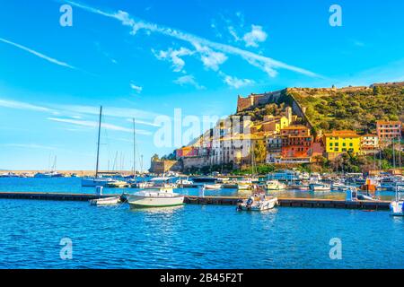 Porto Ercole village and boats in the harbour. Monte Argentario, Maremma Grosseto Tuscany, Italy Stock Photo