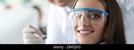 Cute woman wearing glasses in hospital Stock Photo
