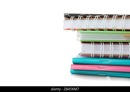 Pile of copybooks isolated on white background Stock Photo