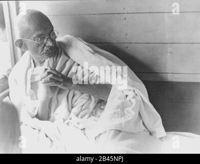 Mahatma Gandhi sitting in train compartment, India, old vintage 1900s picture Stock Photo