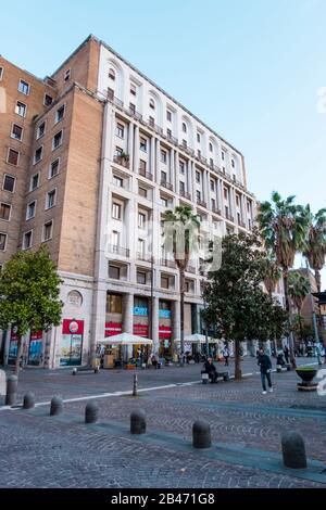 Piazza Carita, with Fascist era post office, Naples, Italy Stock Photo