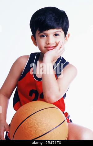 Boy in fancy dress costume as basketball player with ball, MR# Stock Photo  - Alamy