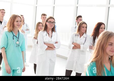large group of medics walking confidently together Stock Photo