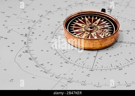 Navigation chart fragment with compass deviation symbol and compass Stock Photo