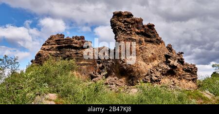 Europe,Iceland , Dimmuborgir is a volcanic formation, Lake Mývatn region. Its name, meaning 'dark castles', is due to the lava formations in the form of columns Stock Photo