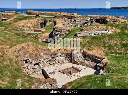 UK, Scotland, Orkney Islands is an archipelago in the Northern Isles of Scotland, , Atlantic Ocean, Skara Brae, a Neolithic settlement located in the Mainland Orkney. In this prehistoric village, one of the best preserved groups of prehistoric houses in Western Europe, people can see the way of life of 5,000 years ago, before Stonehenge was built. Stock Photo