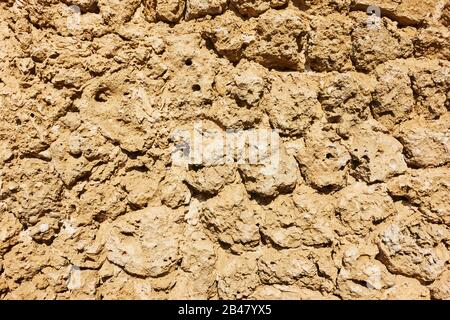 Texture of remains of ancient surrounding wall in Dubai, UAE Stock Photo