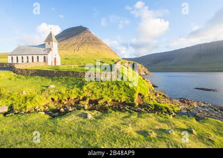 Church by the sea, Vidareidi, Viðareiði, Faroe Islands, Denmark, Northern Europe, Europe Stock Photo