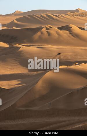 Buggy on sand dunes near Hucachina, Ica, Peru Stock Photo