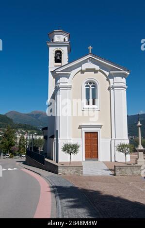 View of the beautiful small Church of the village Porza located in the canton Ticino in Switzerland Stock Photo