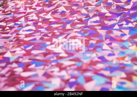 Abstract background with blurred holographic pink shapes Stock Photo