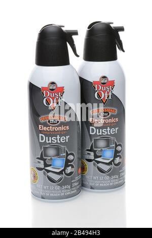 IRVINE, CA - DECEMBER 29, 2014: Two cans of Dust-Off cleaner. From Falcon it contains difluoroethane and is used to remove particulates and dust from Stock Photo