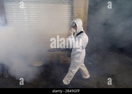Tehran, Iran. 6th Mar, 2020. Firefighter teams with protective suits disinfect the Tajrish Bazaar as a precaution to the coronavirus (Covid-19) in Tehran, Iran. Iranian officials canceled Friday prayer for the second week due to concerns over the spread of coronavirus and COVID-19. According to the last report by the Ministry of Health, there are 4,747 COVID-19 cases in Iran. 147 people have died so far. A Health Ministry spokesman warned authorities could use unspecified 'force' to halt travel between major cities. Credit: Rouzbeh Fouladi/ZUMA Wire/Alamy Live News Stock Photo