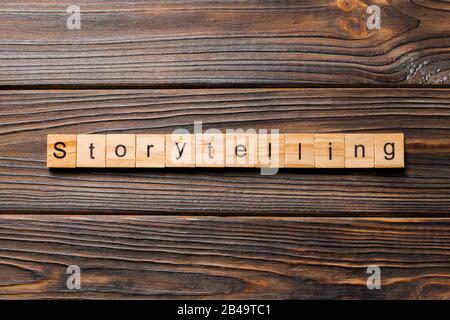 storytelling word written on wood block. storytelling text on table, concept. Stock Photo