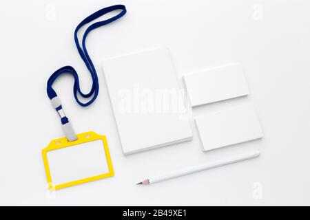 Blank bagde mockup isolated on white background. Nametag with ribbon Stock Photo