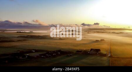 Misty Sunrise over Dunnet Village, Caithness Stock Photo
