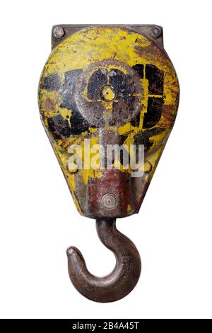 Isolated objects: old yellow hook, part of lifting crane, on white background Stock Photo