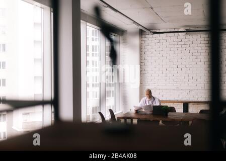 Chief Medical Officer of the department working with documents Stock Photo