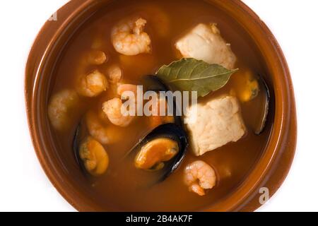 French bouillabaisse soup in bowl isolated on white background. Close up Stock Photo