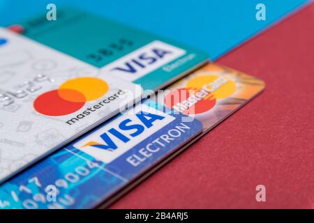 CLUJ, ROMANIA - NOV 08, 2019: MasterCard and VISA macro, closeup on the plastic bank cards. Illustrative editorial, shallow depth of field of the Mast Stock Photo