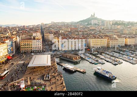 France, Bouches du Rhone, Marseille, the Old Port, the shade house, the Notre Dame de la Garde basilica (aerial view) Stock Photo
