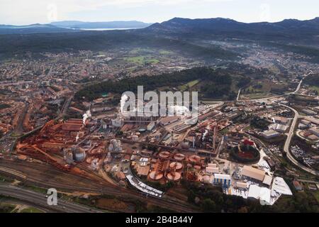 France, Bouches du Rhone, Gardanne, Alteo factory for the production of calcined alumina from bauxite, ocher color, imported from Guinea. whose liquid effluents loaded with soda and heavy metals are discharged into the Calanques National Park of Marseille (aerial view) Stock Photo