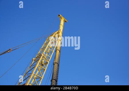 Diesel hammer machine for installing concrete piles for the foundation of a new building Stock Photo