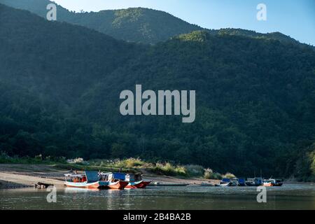 Laos, Phongsaly province, around Muang Khua town, boats on the Nam Ou river Stock Photo