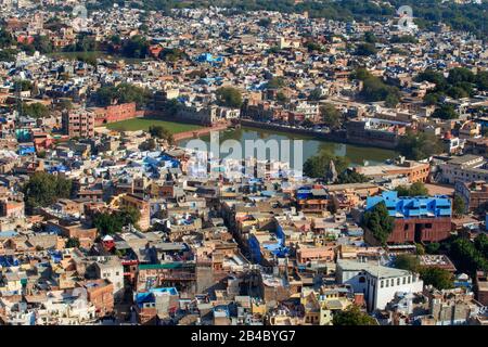 Aerial view of Jodhpur blue city scape from the top of Mehrangarh Fort at Jodhpur, Rajasthan, India. This is one of the excursion of the Luxury train Stock Photo