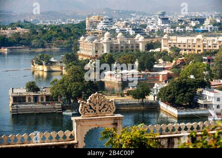 Lake pichola and Udaipur city from Udaipur City Palace museum in Udaipur, Rajasthan, India. This is one of the excursion of the Luxury train Maharajas