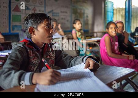 Children at the school in Raiyoli village in Balasinor Gujarat Rajasthan India. This is one of the excursion of the Luxury train Maharajas express. Stock Photo