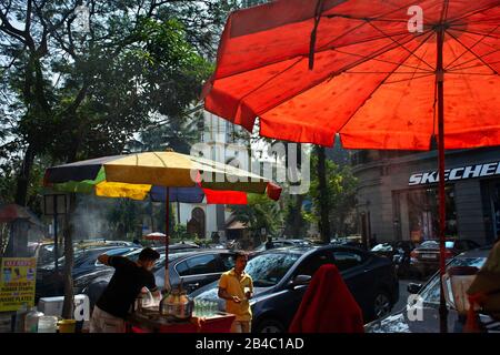 Food stall street next to the St Thomas cathedral at Horniman circle in Mumbai, India. Started in CE 1672 and finished in CE 1718, it is the first Ang Stock Photo