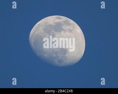 Sheerness, Kent, UK. 6th Mar, 2020. UK Weather: a waxing gibbous moon set against clear blue skies above Sheerness in Kent. Credit: James Bell/Alamy Live News Stock Photo
