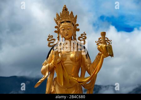 Statues of buddhist goddesses at top hill in Kuenselphodrang Nature Park, Thimphu, Bhutan - Goddesses statues at Buddha Dordenma site Stock Photo