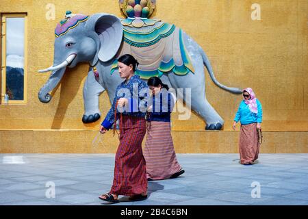 Buddhist praying at the Buddha Dordenma statue, Kuenselphodrang Nature Park, Thimphu, Bhutan Stock Photo