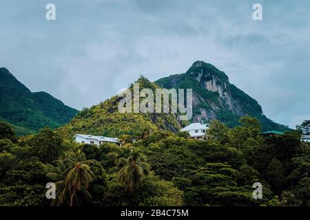 Villas sitting in mountains on Mahe Island, Seychelles. Stock Photo