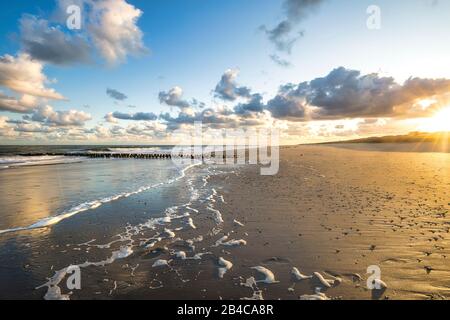 The beach near the dutch villages Westkapelle and Domburg on a warm summer morning. Stock Photo