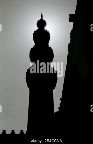 Black And White Travel Photography - Blue Aqsunqur Mosque minaret in Islamic Fatimid Cairo district of Cairo in Egypt in North Africa Middle East Stock Photo