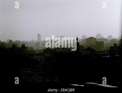 Twilight sunset view over the downtown and Islamic districts of the city of Cairo from Al Azhar Park in Egypt in North Africa Stock Photo