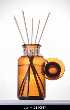 Air refresher bottle mock up, reed diffuser on a white background. Aromatherapy concept. Home fragrance bottle Stock Photo