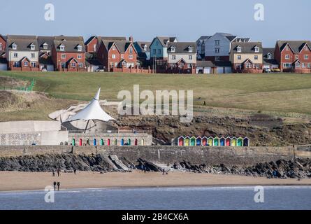 Whitmore Bay on Barry Island south Wales with new housing behind, south Wales Stock Photo