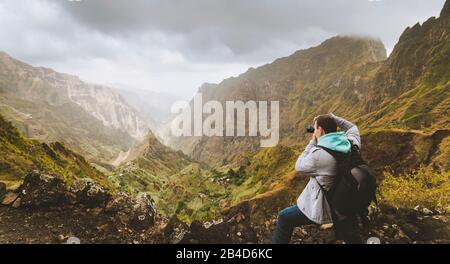Santo Antao Island, Cape Verde. Travel hiker photographing unique surreal Xo Xo valley and mountain tops. Stock Photo