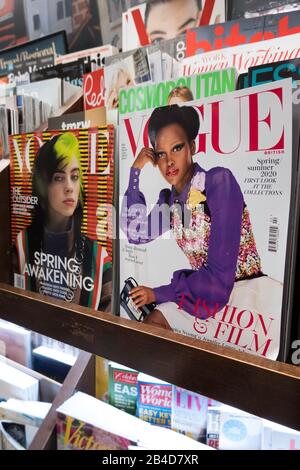 Magazine Stand Featuring Magazine Cover Stock Photo