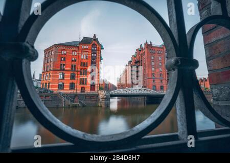 Historic warehouse district in Hamburg, Germany, Europe, old brick buildings and canal of the Hafencityviertel, UNESCO heritage Stock Photo