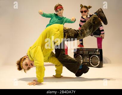 unique kids,cheerful children dressed in hip hop style,dancing kids, break dance kids Stock Photo