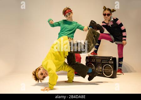 unique kids,cheerful children dressed in hip hop style,dancing kids, break dance kids Stock Photo