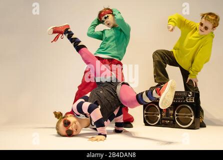 unique kids,cheerful children dressed in hip hop style,dancing kids, break dance kids Stock Photo